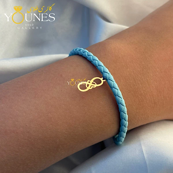 دستبند چرم آبی قلب بینهایت طلا